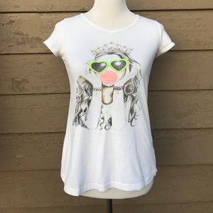 A white shirt with a tie on the back and a design